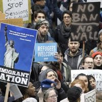 Activists gather at Portland International Airport to protest against President Donald Trump's executive action travel ban in Portland (REUTERS/Steve Dipaola)