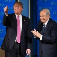 Donald Trump with the Rev. Pat Robertson in 2016 at Virginia’s Regent University, founded by Robertson. This month Robertson was granted a White House interview with the president for the Christian Broadcasting Network, also founded by the televangelist. (Steve Helber / AP)