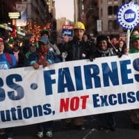 Members of labor unions and Occupy Wall Street demonstrators participate in a "March For Jobs and Fairness" on Dec 1, 2011 in New York City. Thousands attended the late afternoon rally which included members of over 300 New York City and tri-state unions. (Photo by Spencer Platt/Getty Images)