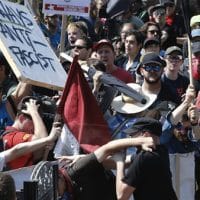 Counter demonstrators clash with white supremacist's at the entrance to Emancipation Park in Charlottesville, US [Steve Helber/AP]