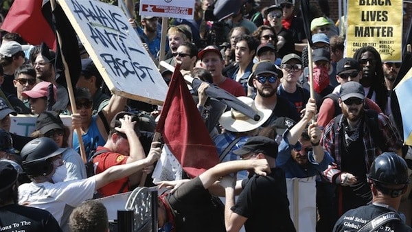 | Counter demonstrators clash with white supremacists at the entrance to Emancipation Park in Charlottesville US Steve HelberAP | MR Online