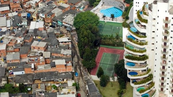 | A shantytown in São Paulo Brazil borders the much more affluent Morumbi district Credit Tuca Vieira Oxfam | MR Online