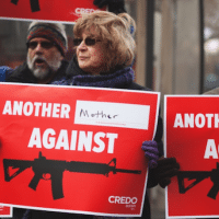 Protesters call on the NRA to stand down and stop blocking Congress and the president from passing sensible gun control legislation in 2012 Photo: Josh Lopez/Creative Commons