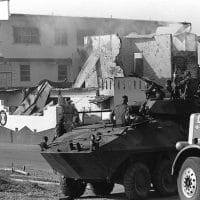 | Marines stand guard outside a destroyed Panamanian Defense Force building during the first day of Operation Just Cause on 20 December 1989 | MR Online