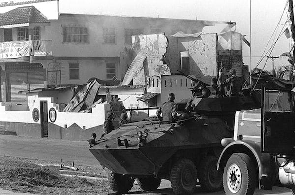 | Marines stand guard outside a destroyed Panamanian Defense Force building during the first day of Operation Just Cause on 20 December 1989 | MR Online