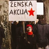 Ankica Čakardić holding a banner Women's action, photo by Ivan Maričić (private collection).