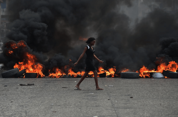 | If you dont let us breathe we wont let you breathe Port au Prince Haiti 2019 Photograph Hector Retamal | MR Online