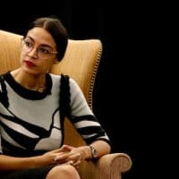 Alexandria Ocasio-Cortez participates in a town hall held in support of Kerri Evelyn Harris, Democratic candidate for U.S. Senate in Delaware, Aug. 31, 2018, at the University of Delaware in Newark, Del. Patrick Semansky | AP