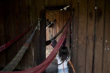 | A child runs inside an Uru Eu Wau Wau house in the village of Tribe 623 on June 10 2019 White settlers in the 1970s waged war on Indigenous tribes and brought in devastating diseases today there are 200 members of the Uru Eu Wau Wau remaining Photo Gabriel Uchida | MR Online