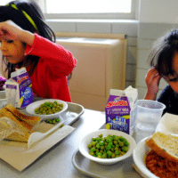 Fairview Elementary School students in the school cafeteria in Denver, Colorado. (Photo- Andy Cross:The Denver Post via Getty Images)