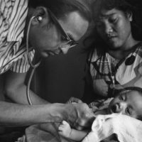 A medical team conducting annual medical examinations of Marshallese people who were exposed to radioactive fallout from an atmospheric nuclear weapons test in 1954. Credit: US Dept. of Energy.