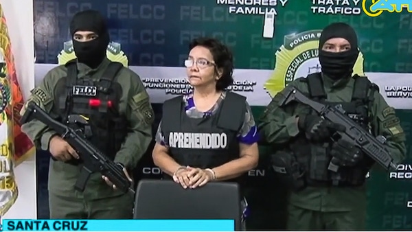 | A press conference announcing the arrest of Hospital Administrator Mirtha Sanjinez center in La Paz Bolivia Screenshot | YouTube | MR Online