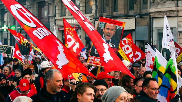 | Protestors carry a poster depicting French President Emmanuel Macron during a demonstration Thursday Jan 16 2020 in Lille northern France Protesters are denouncing French President Emmanuel Macrons plans to overhaul the national pension systemAP PhotoMichel Spingler | MR Online