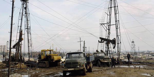 | BAKU AZERBAIJAN OCTOBER 26 FILE PHOTO Ageing infrastructure leaking crude oil and debris from decades of extraction litter an oil field October 26 2006 in Baku Azerbaijan Oil rich Azerbaijan gained independence from the Soviet Union in 1991 and its wealth of oil has been responsible for both its development and success as well as its status as one of the most polluted environments in the world Azerbaijan have joined the Ukraine in the construction of the Odessa Brody pipeline to provide Europe with 6 7 million tones of oil each year and will reduce dependence on giant Russian energy firm Gazprom Photo by Wojtek LaskiGetty Images | MR Online