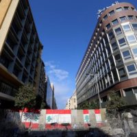 FILE PHOTO: Concrete barriers erected by authorities to block a street hosting banks and financial institutions near the government palace in Beirut, Lebanon, January 24, 2020. REUTERS/Aziz Taher/File Photo