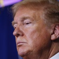 President Donald Trump listens during a briefing about the coronavirus in the James Brady Press Briefing Room of the White House, yesterday