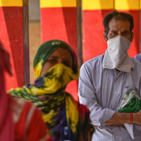 | People waiting for ration packets in New Delhi during Indias national lockdown Sanchit KhannaHindustan Times via Getty Images | MR Online