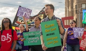 | Protesters supporting a Green New Deal participate in a march in Washington July 2019 Photo from Flickr | MR Online