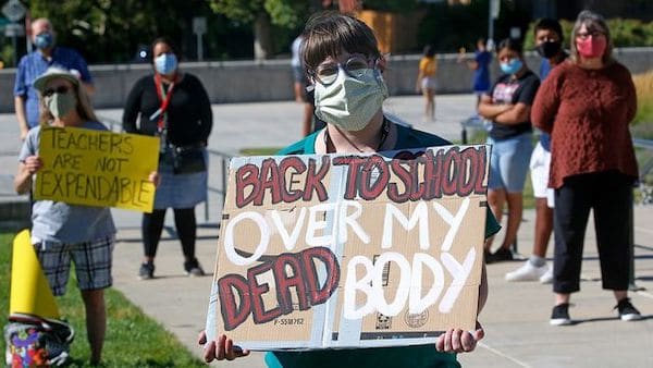 | Junior high teacher Angela Andrus at a rally Thursday July 23 2020 in Salt Lake City Utah AP PhotoRick Bowmer | MR Online