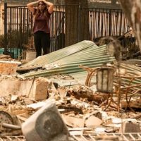 Resident Alyssa Medina reacts while looking over the charred remains of her family home during the LNU Lightning Complex fire in Vacaville, California on August 23, 2020. (Photo: Josh Edelson/AFP via Getty Images)