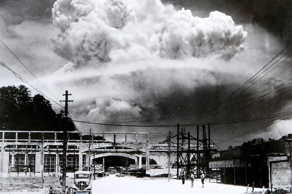 | The bombing of Nagasaki as seen from the town of Koyagi about 13 km south taken 15 minutes after the bomb exploded In the foreground life seemingly went on unaffected Wikipedia | MR Online