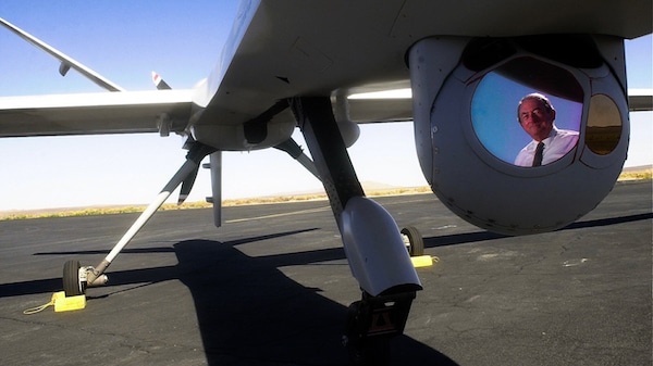 | Thomas J Cassidy Former President and CEO of General Atomics is reflected in the camera gimbal on a prototype Predator B Sept 6 2001 in El Mirage Calif Doug Benc | AP | MR Online