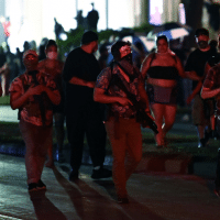 | Armed men march in Kenosha Some of the men pictured are wearing Hawaiian shirts commonly used to signal association with the boogaloo movement Photo by REUTERSStephen Maturen | MR Online