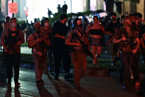 | Armed men march in Kenosha Some of the men pictured are wearing Hawaiian shirts commonly used to signal association with the boogaloo movement Photo by REUTERSStephen Maturen | MR Online