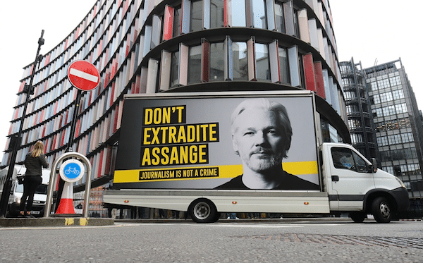 | A mobile advertising board with a Dont Extradite Assange message outside the Old Bailey London | MR Online