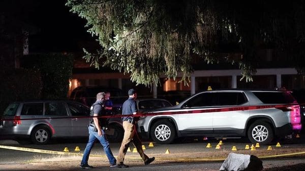 | Police walk past evidence markers at a scene Thursday Sept 3 in Lacey Wash where Michael Reinoehl 48 was killed by a federal task force AP PhotoTed Warren | MR Online