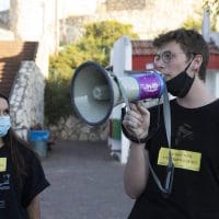 | Conscientious objectors Shahar Peretz left and Daniel Peldi at an anti annexation protest in the city of Rosh Haayin June 2020 Oren Ziv | MR Online