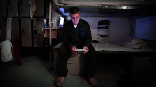 | Anthony Plant reads from a tablet at his bunk at the New Hampshire State Prison for Men in Concord NH Charles Krupa | AP | MR Online