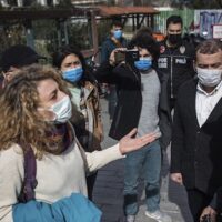 | A supporter of Bogazici University students talks to police officers outside a courthouse in Istanbul Thursday Feb 11 2021 | MR Online