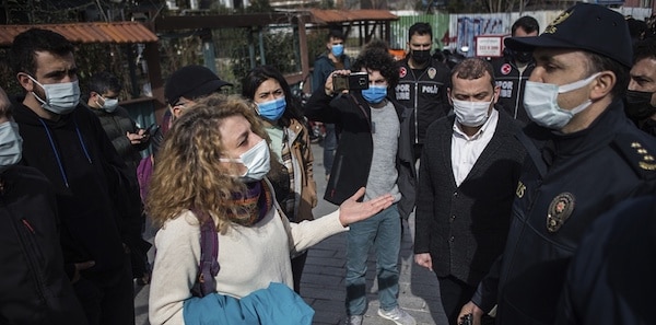 | A supporter of Bogazici University students talks to police officers outside a courthouse in Istanbul Thursday Feb 11 2021 | MR Online