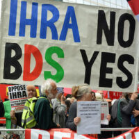 PROTEST BANNER IN LONDON, 2018. (PHOTO: JEWISH VOICE FOR LABOUR (UK) VIA THE PALESTINE POSTER PROJECT ARCHIVES)