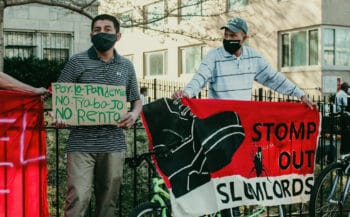 | Tenants and supporters hold signs facing the street One on the left reads because of the pandemic no food no rent Eleanor Goldfield | ArtKillingApathycom | MR Online