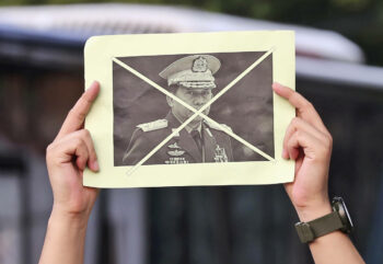 | An activist holds up a defaced portrait of Myanmars Commander in Chief Senior General Min Aung Hlaing during a rally against the military coup in Jakarta Indonesia Saturday April 24 2021 Southeast Asian leaders met Myanmars top general and coup leader in an emergency summit in Indonesia Saturday | Tatan Syuflana AP | MR Online