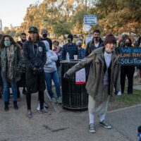 | Valerie a homeless resident of Echo Park Lake in Los Angeles speaks to journalists during a protest against the parks closure on March 24 2021 Photo credit Jeremy Lindenfeld WhoWhatWhy | MR Online