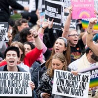 Protesters block the street in front of the Supreme Court in Washington, D.C., on Oct. 8, 2019, as the court hears arguments on whether gay and transgender people are covered by a federal law barring employment discrimination on the basis of sex. (Credit: Bill Clark/Getty Images)