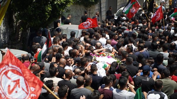 | MOURNERS IN BEIT UMMAR CARRY THE BODY OF 11 YEAR OLD MOHAMMED AL ALAMI WHO WAS KILLED BY ISRAELI SOLDERIS WHILE ON HIS WAY HOME FROM GROCERY SHOPPING WITH HIS FAMILY JULY 29TH 2021 | MR Online