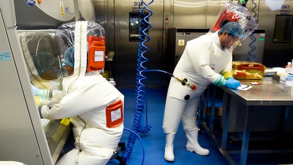 | Researchers work in a lab of the Wuhan Institute of Virology in Wuhan in central Chinas Hubei province Feb 23 2017 | MR Online