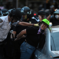 A legal observer from the National Lawyers Guild is arrested in the Mott Haven neighborhood of New York City on June 4, 2020. Photo: C.S. Mundy