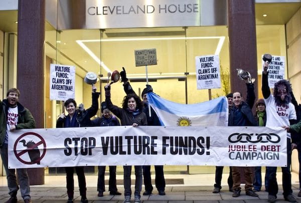 | Debt campaigners protest the impact of vulture funds on Argentina outside the office of Elliott Advisors owners of NML Capital in New York in February 2013 | MR Online