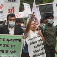 Students Federation of India (SFI) activists protest against alleged communal violence in Tripura, at Tripura Bhawan in New Delhi, Friday, Nov. 05, 2021.