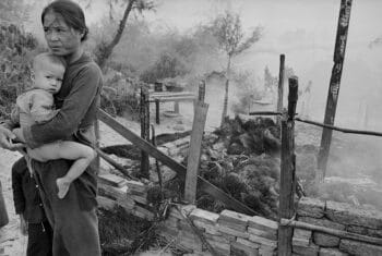 | A mother and her child after the burning of their village near Saigon during the Vietnam War CFP | MR Online