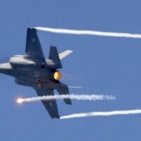 A U.S.-made Israeli F-35 fighter jet performs during an air show over the beach in the Mediterranean coastal city of Tel Aviv, 9 May 2019 (AFP)