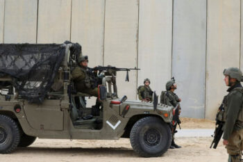 | ISRAELI SOLDIERS STAND GUARD DURING THE UNVEILING OF A NEWLY COMPLETED UNDERGROUND BARRIER ALONG ISRAELS FRONTIER WITH THE GAZA STRIP IN EREZ SOUTHERN ISRAEL DECEMBER 7 2021 | MR Online