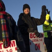 Kelly Stokes, Kathy Webb, LaKisha Scott and Brenda Flemons picket outside Kellogg Co.