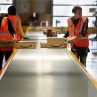 | Not everyone smilingAmazon workers at Vélizy Villacoublay in France Frederic LegrandCOMEO shutterstockcom | MR Online