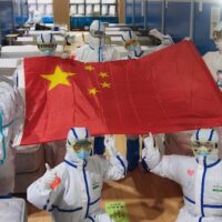 Chinese medical workers at the Wuchang temporary hospital in Wuhan in March 2020